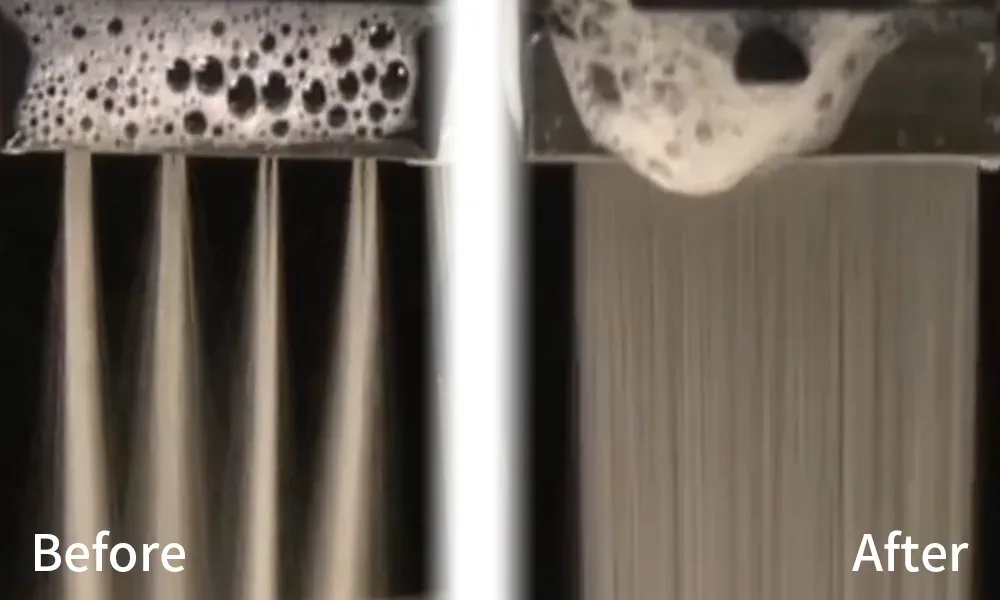 Macro photograph of printhead nozzles jetting before and after cleaning, breaking into droplets versus clean streams