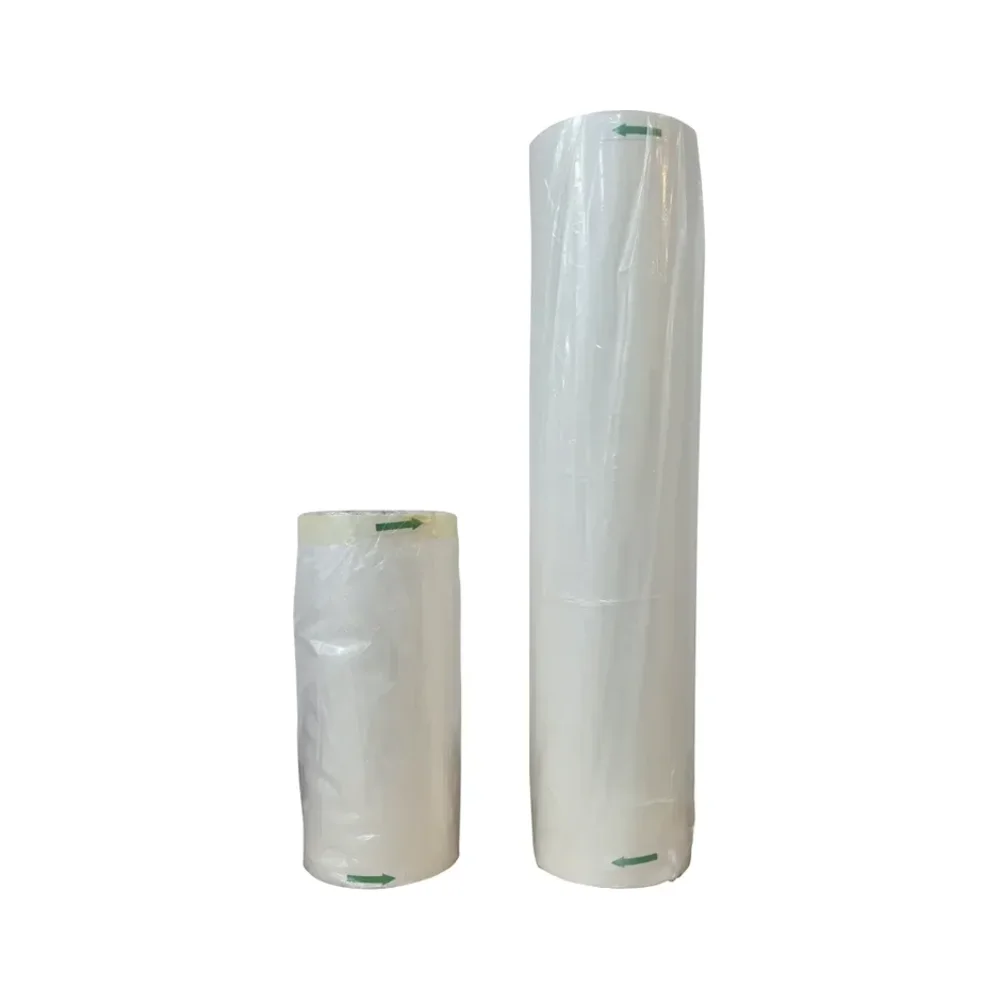Two rolls of DTF transfer film in 30 cm and 60 cm widths, wrapped and standing upright