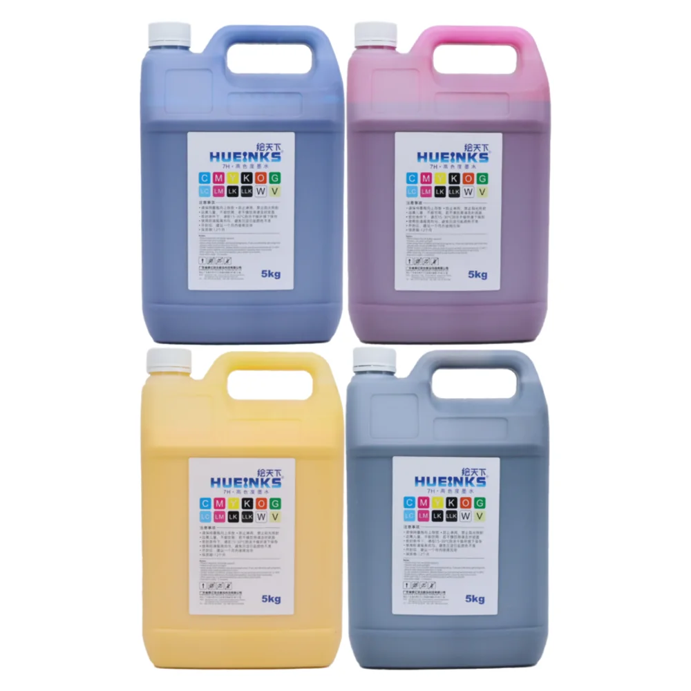 Four 5 kg HUEINKS ink bottles in cyan, magenta, yellow and black, all carrying the same label