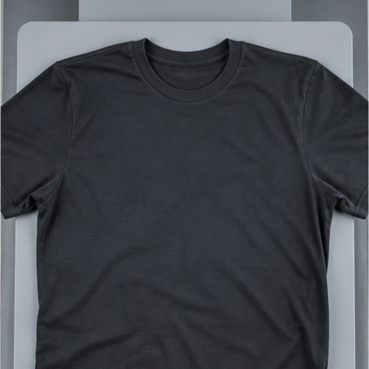 Before printing. Dark cotton garment positioned on the platen before white and color are jetted.