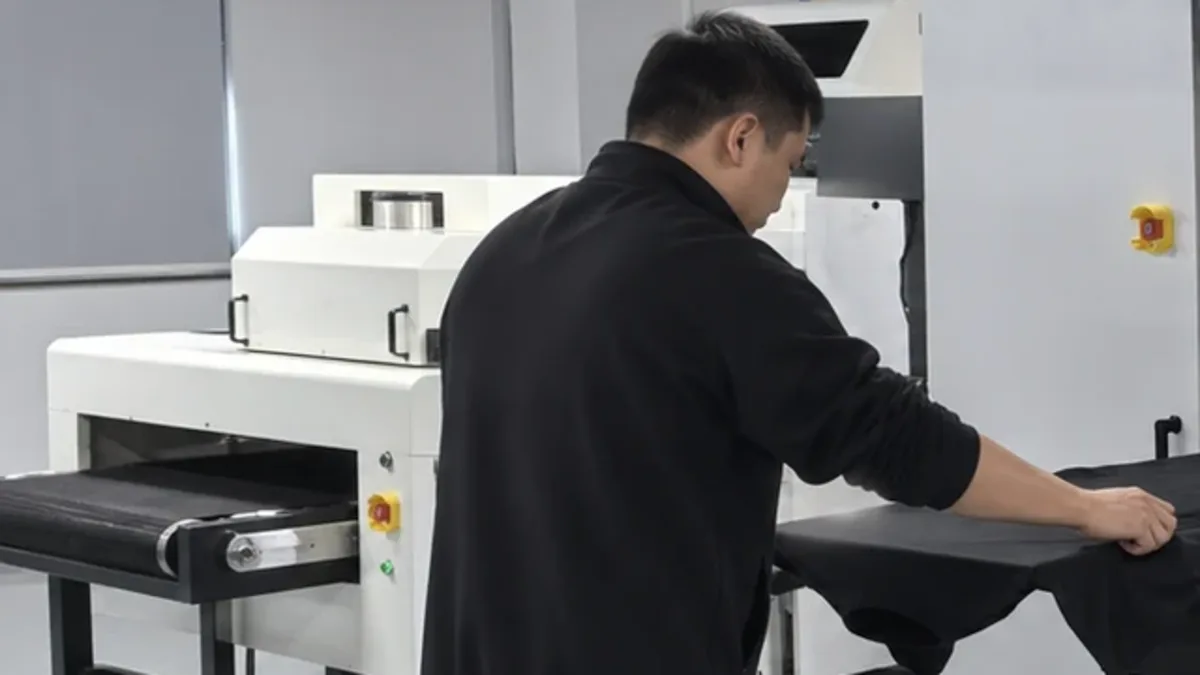 External tunnel dryer positioned beside the HY 2D DTG production line
