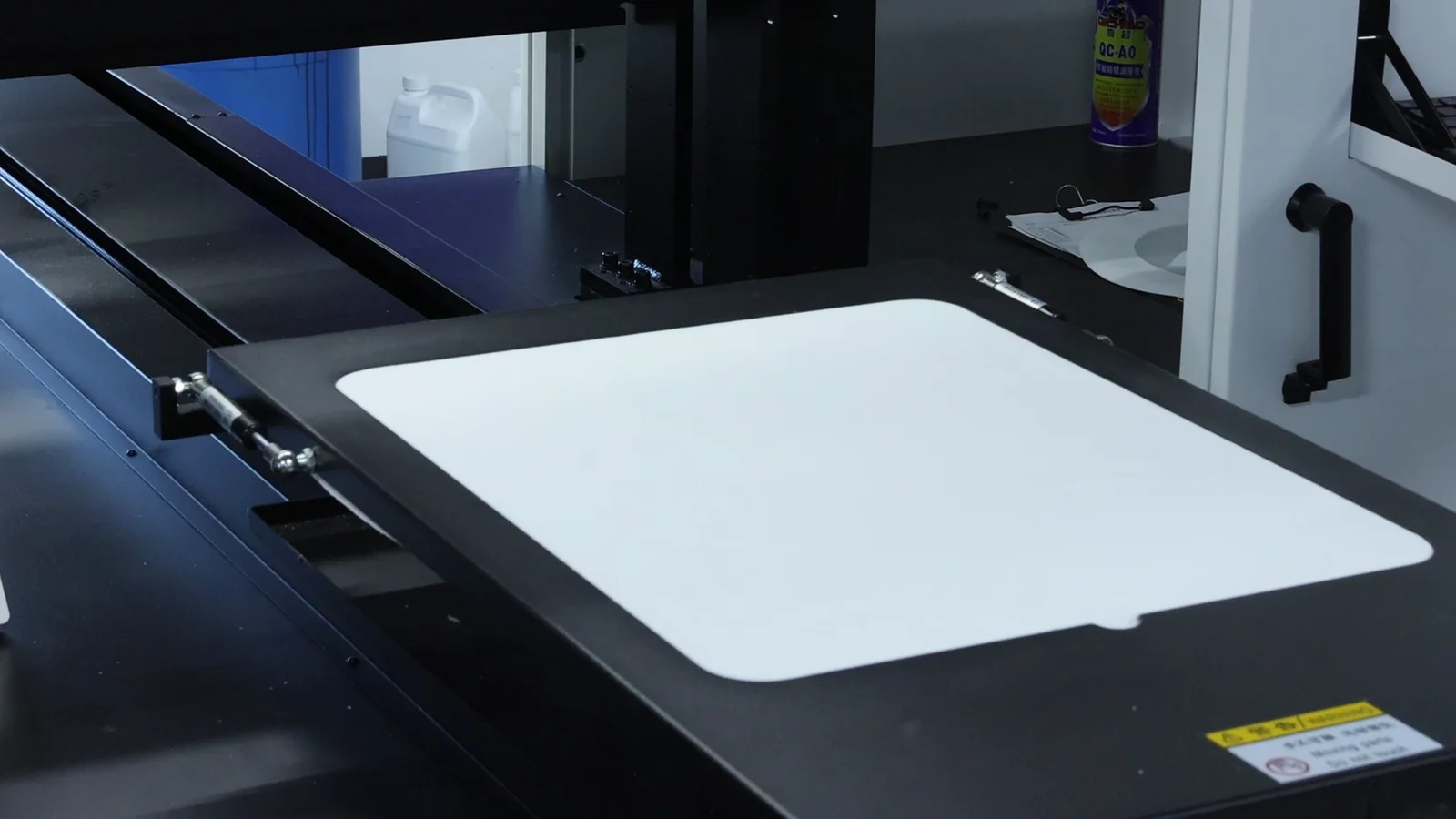 Before printing. Prepared light-cotton panel positioned on the platen before printing.